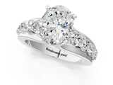 White gold Oval Brilliant Solitaire with Side Stones on a Pave Band and Four-Prong Setting_27