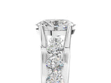 White gold Oval Brilliant Solitaire with Side Stones on a Pave Band and Four-Prong Setting_31