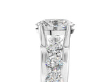 White gold Oval Brilliant Solitaire with Side Stones on a Pave Band and Four-Prong Setting_67