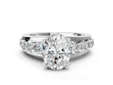 White gold Oval Brilliant Solitaire with Side Stones on a Pave Band and Four-Prong Setting_75