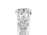 White gold Oval Brilliant Solitaire with Side Stones on a Pave Band and Four-Prong Setting_81