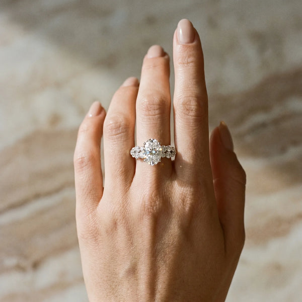 White gold Oval Cluster Diamond Engagement Ring with Pavé Band and Four-Prong Setting