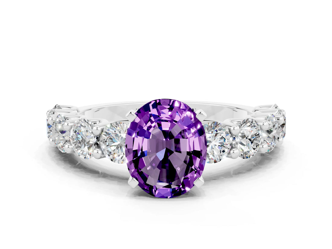 White gold Oval Cut Amethyst Prong Setting with Side Stones on a Pave Band