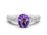 White gold Oval Cut Amethyst Prong Setting with Side Stones on a Pave Band