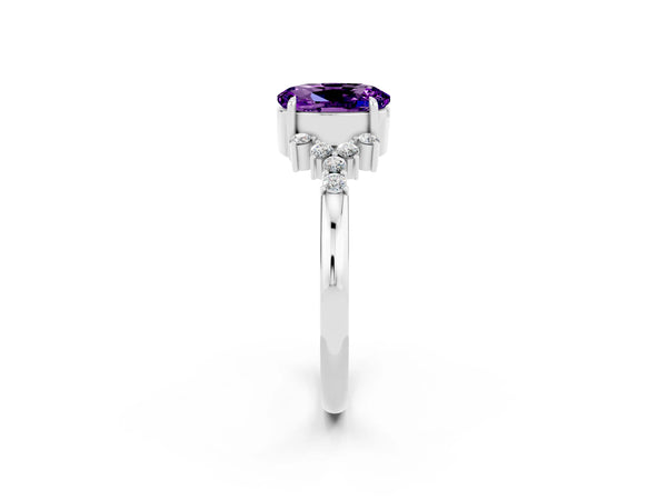 Silver Oval Cut Amethyst Ring with Side Stones and Four-Prong Setting