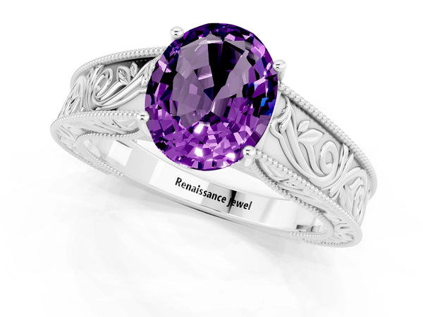 Platinum Oval Cut Amethyst Solitaire Ring with Engraved Band and Four-Prong Setting