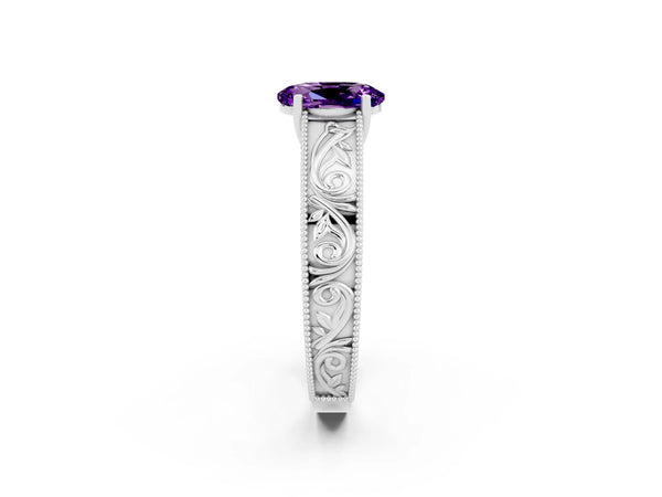 Silver Oval Cut Amethyst Solitaire Ring with Engraved Band and Four-Prong Setting
