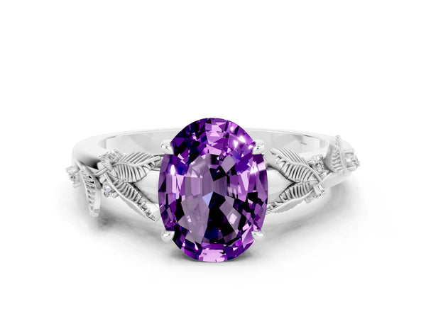 Silver Oval Cut Amethyst Solitaire Ring with Leaf Motif Band and Four-Prong Setting