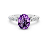 White gold Oval Cut Amethyst Solitaire Ring with Pavé Accents and Four-Prong Setting