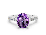 White gold Oval Cut Amethyst Solitaire with Side Baguettes and Channel Set Band