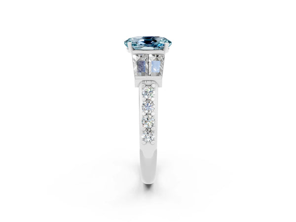 Platinum Oval Cut Aquamarine Engagement Ring with Baguette Side Stones and Channel Set Band