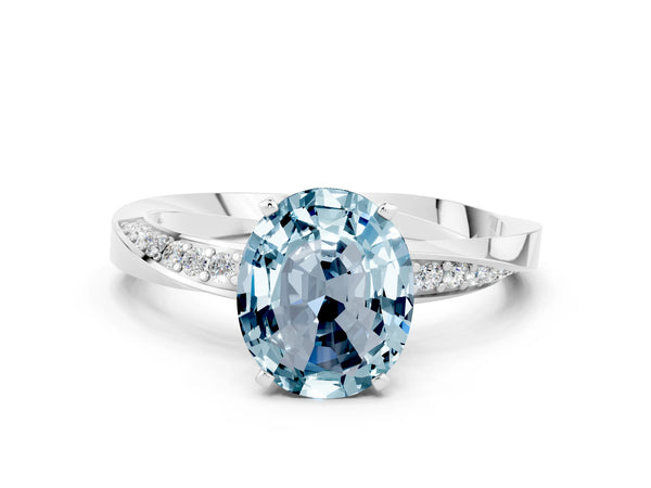 Platinum Oval Cut Aquamarine Engagement Ring with Side Stone Accents and Four-Prong Setting