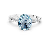 White gold Oval Cut Aquamarine Engagement Ring with Side Stone Accents and Four-Prong Setting_36