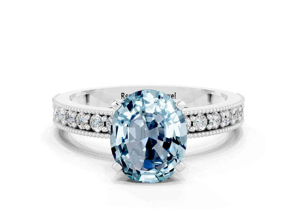 Platinum Oval Cut Aquamarine Milgrain Pavé Engagement Ring with Four-Prong Setting