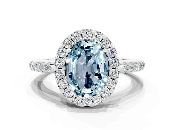 Platinum Oval Cut Aquamarine Pavé Halo Ring with Four-Prong Setting