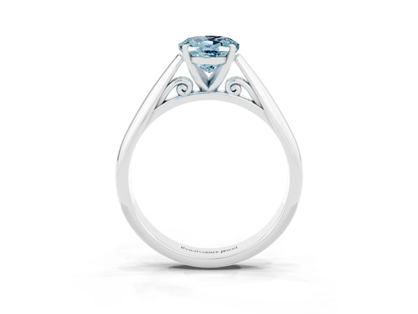 Platinum Oval Cut Aquamarine Solitaire Engagement Ring with Cathedral Setting and Four-Prong Mount