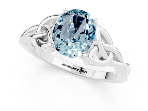 White gold Oval Cut Aquamarine Solitaire Engagement Ring with Celtic Knot Band and Four-Prong Setting_1
