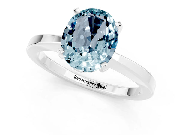 Silver Oval Cut Aquamarine Solitaire Engagement Ring with Classic Band and Four-Prong Setting