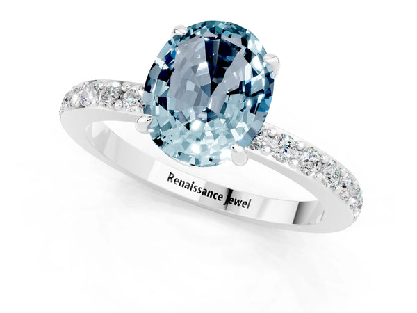 Silver Oval Cut Aquamarine Solitaire Engagement Ring with Pavé Band and Four-Prong Setting