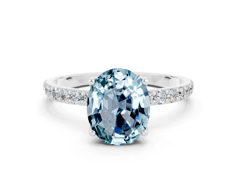 White gold Oval Cut Aquamarine Solitaire Engagement Ring with Pavé Band and Prong Setting