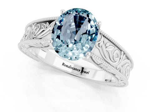 White gold Oval Cut Aquamarine Solitaire Ring with Engraved Band and Four-Prong Setting_1