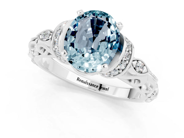 Silver Oval Cut Aquamarine Solitaire Ring with Filigree Band and Four-Prong Setting