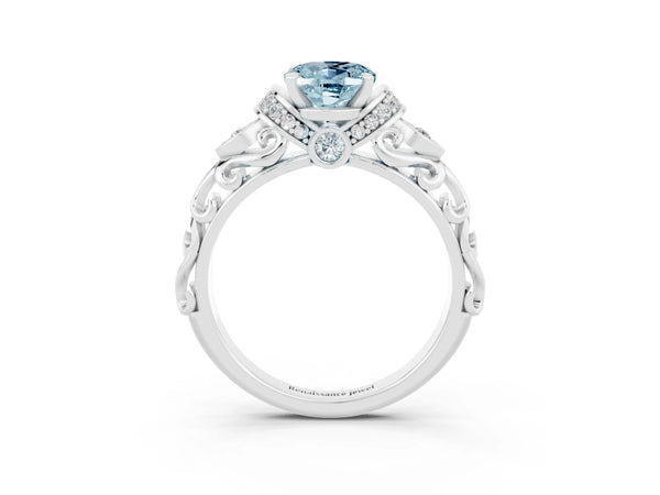 Platinum Oval Cut Aquamarine Solitaire Ring with Filigree Band and Four-Prong Setting