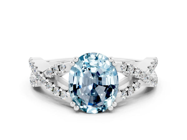 White gold Oval Cut Aquamarine Solitaire Ring with Four-Prong Setting and Twisted Pavé Band