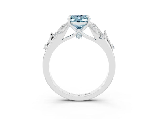 White gold Oval Cut Aquamarine Solitaire Ring with Leaf Motif Band and Four-Prong Setting