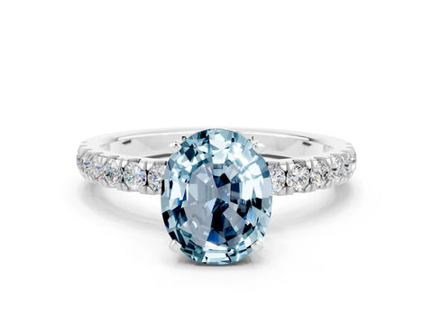 White gold Oval Cut Aquamarine Solitaire Ring with Pavé Accents and Four-Prong Setting