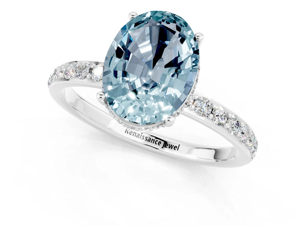 Silver Oval Cut Aquamarine Solitaire Ring with Pavé Band and Hidden Halo