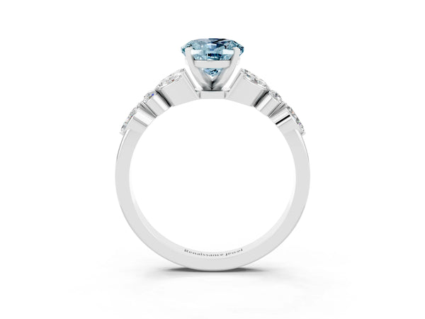 Silver Oval Cut Aquamarine Solitaire Ring with Side Stones and Four-Prong Setting