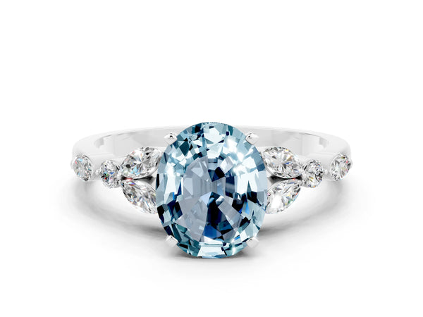 White gold Oval Cut Aquamarine Solitaire Ring with Side Stones and Four-Prong Setting