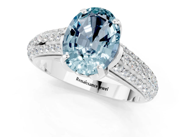 Silver Oval Cut Aquamarine Solitaire Ring with Three-Row Pavé Band and Four-Prong Setting
