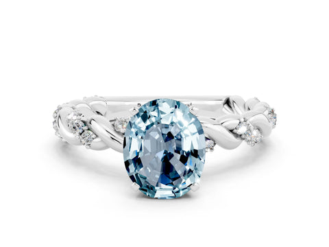 White gold Oval Cut Aquamarine Solitaire Ring with Twisted Band and Pavé Accents