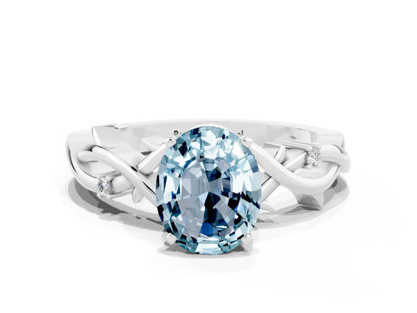 Platinum Oval Cut Aquamarine Solitaire Ring with Twisted Band and Prong Setting