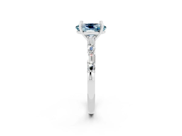 White gold Oval Cut Aquamarine Solitaire with Side Baguettes and Channel Set Band