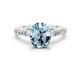 White gold Oval Cut Aquamarine Solitaire with Side Baguettes and Channel Set Band