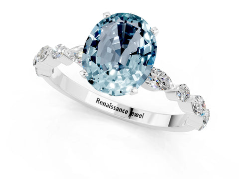 White gold Oval Cut Aquamarine Solitaire with Side Stones on a Pavé Band and Four-Prong Setting_1