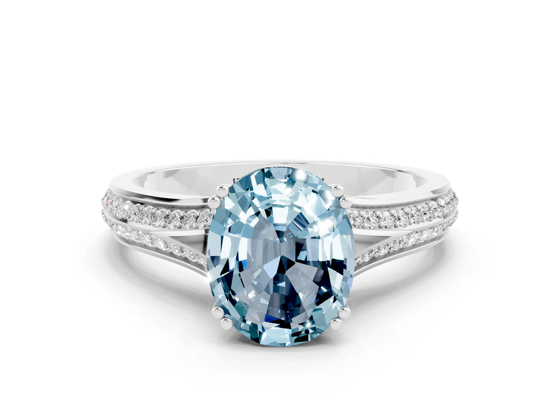 White gold Oval Cut Aquamarine Split Shank Engagement Ring with Pavé Band