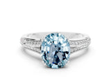 White gold Oval Cut Aquamarine Split Shank Engagement Ring with Pavé Band