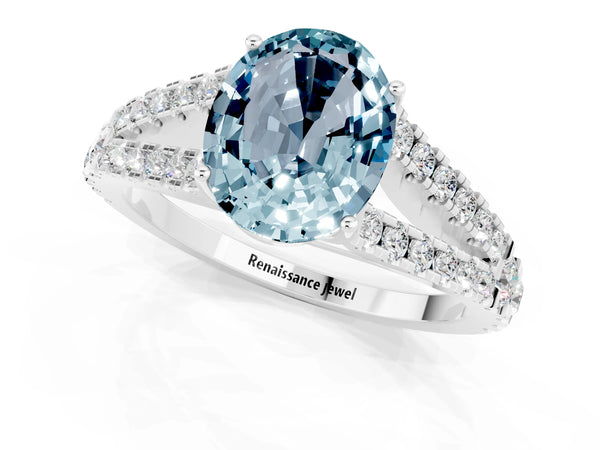 White gold Oval Cut Aquamarine Split Shank Pavé Engagement Ring with Four-Prong Setting