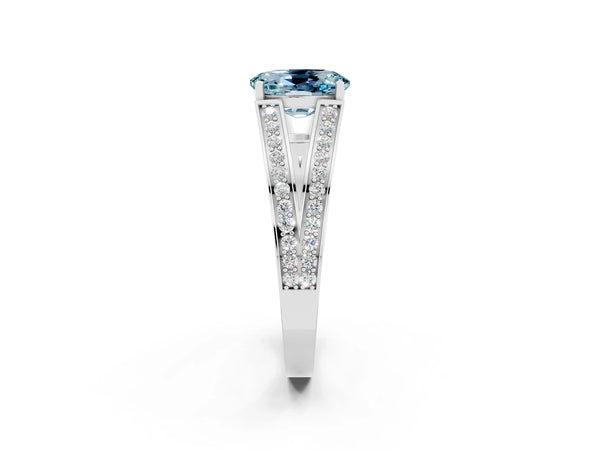 White gold Oval Cut Aquamarine Split Shank Ring with Pavé Band and Four-Prong Setting