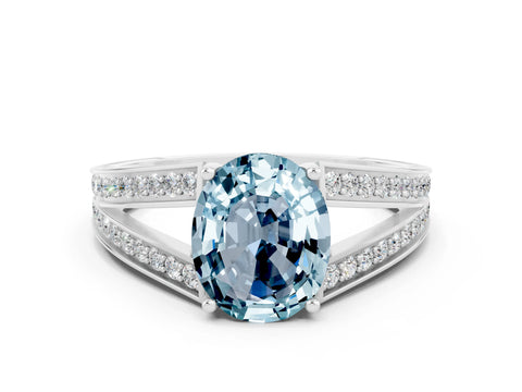 White gold Oval Cut Aquamarine Split Shank Ring with Pavé Band and Four-Prong Setting