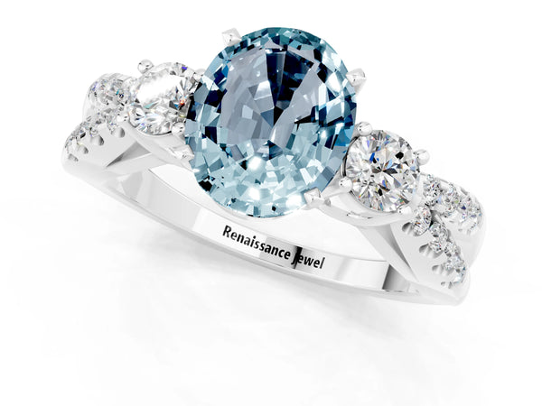Platinum Oval Cut Aquamarine Three-Stone Ring with Pavé Split Shank and Four-Prong Setting