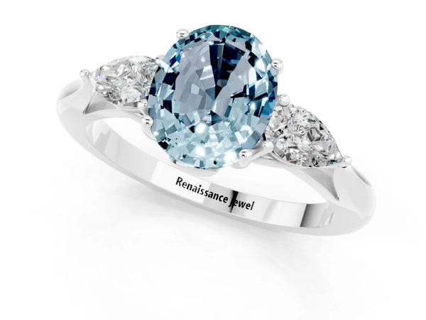 Silver Oval Cut Aquamarine Three-Stone Ring with Pear  Side Stones and Prong Setting