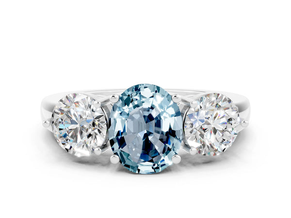 Platinum Oval Cut Aquamarine Three-Stone Ring with Prong Setting and Classic Band