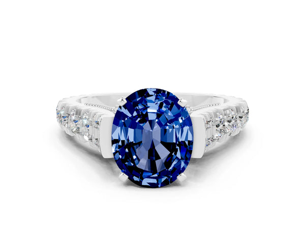 Silver Oval Cut Blue Sapphire Classic Solitaire Ring with Pavé Band and Four-Prong Setting