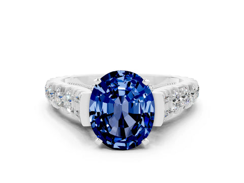 White gold Oval Cut Blue Sapphire Classic Solitaire Ring with Pavé Band and Four-Prong Setting