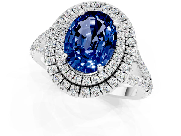 Platinum Oval Cut Blue Sapphire Double Halo Ring with Pavé Band and Prong Setting